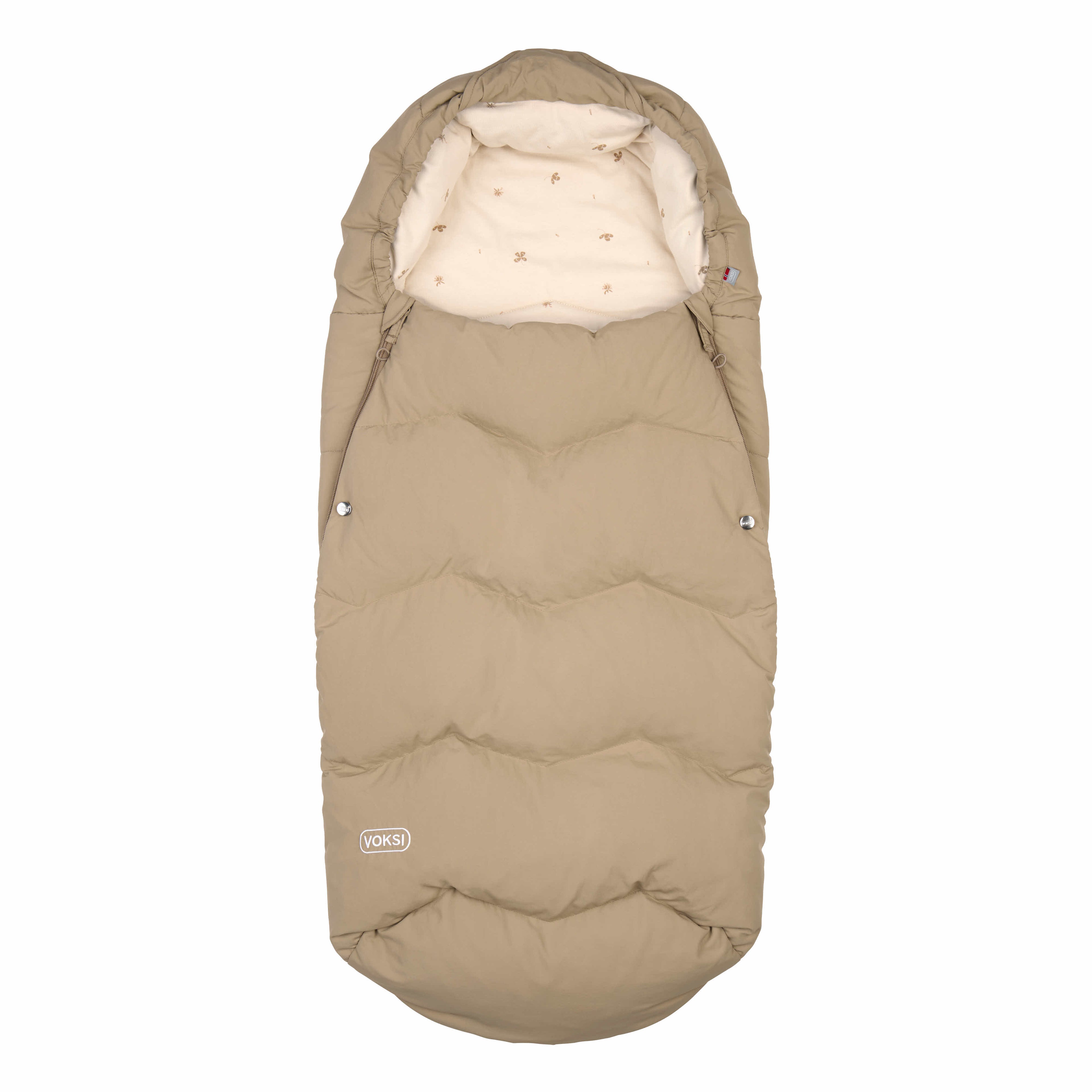Beige sleeping bag with white lining on a white background